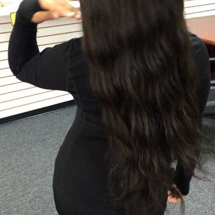 Client wearing our Raw Hair Extensions